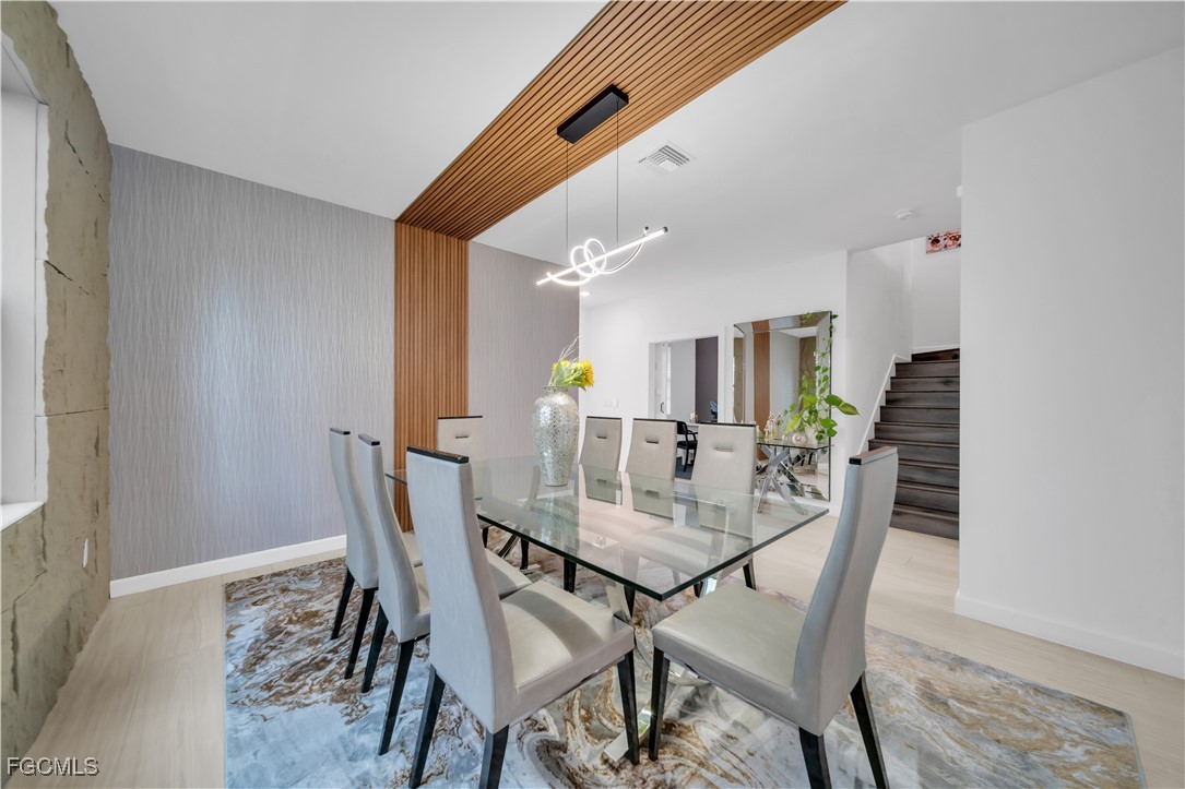 11264 Canopy Loop Fort Myers, FL 33913 - Photo 11 of 49 a view of a dining room with furniture