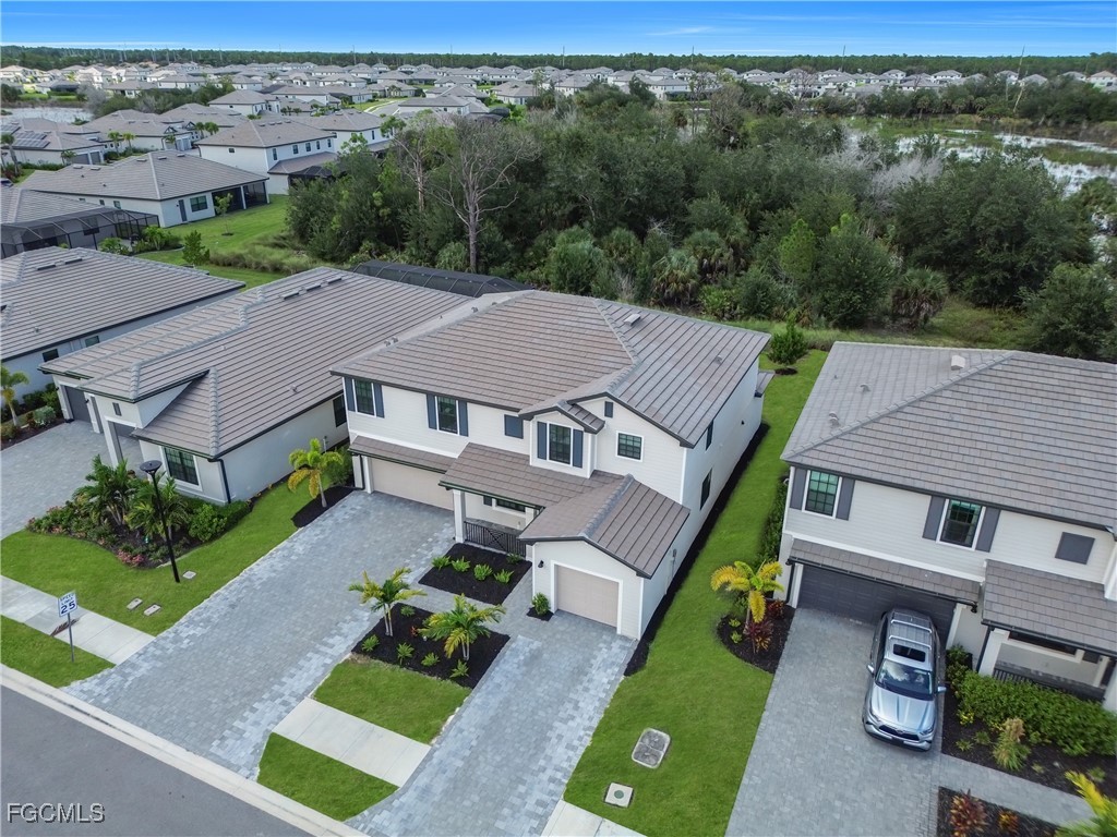 11264 Canopy Loop Fort Myers, FL 33913 - Photo 2 of 49 an aerial view of a house