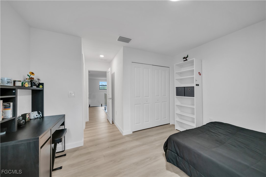11264 Canopy Loop Fort Myers, FL 33913 - Photo 38 of 49 a view of a workspace with furniture and wooden floor