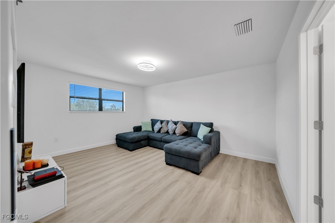 11264 Canopy Loop Fort Myers, FL 33913 - Photo 40 of 49 a living room with furniture and a window