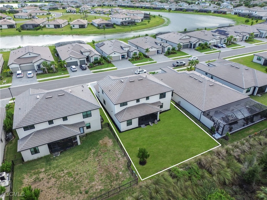 11264 Canopy Loop Fort Myers, FL 33913 - Photo 4 of 49 an aerial view of a house with a garden