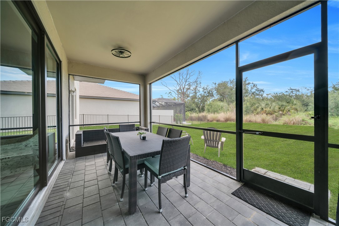 11264 Canopy Loop Fort Myers, FL 33913 - Photo 47 of 49 a view of a dining room with furniture window and outside view