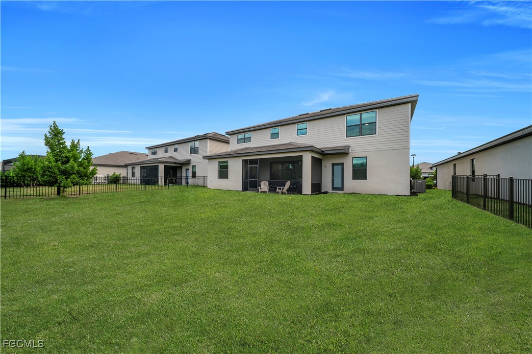 11264 Canopy Loop Fort Myers, FL 33913 - Photo 49 of 49 a front view of house with a garden