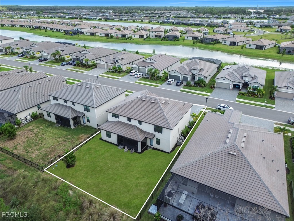 11264 Canopy Loop Fort Myers, FL 33913 - Photo 5 of 49 an aerial view of a house with a garden