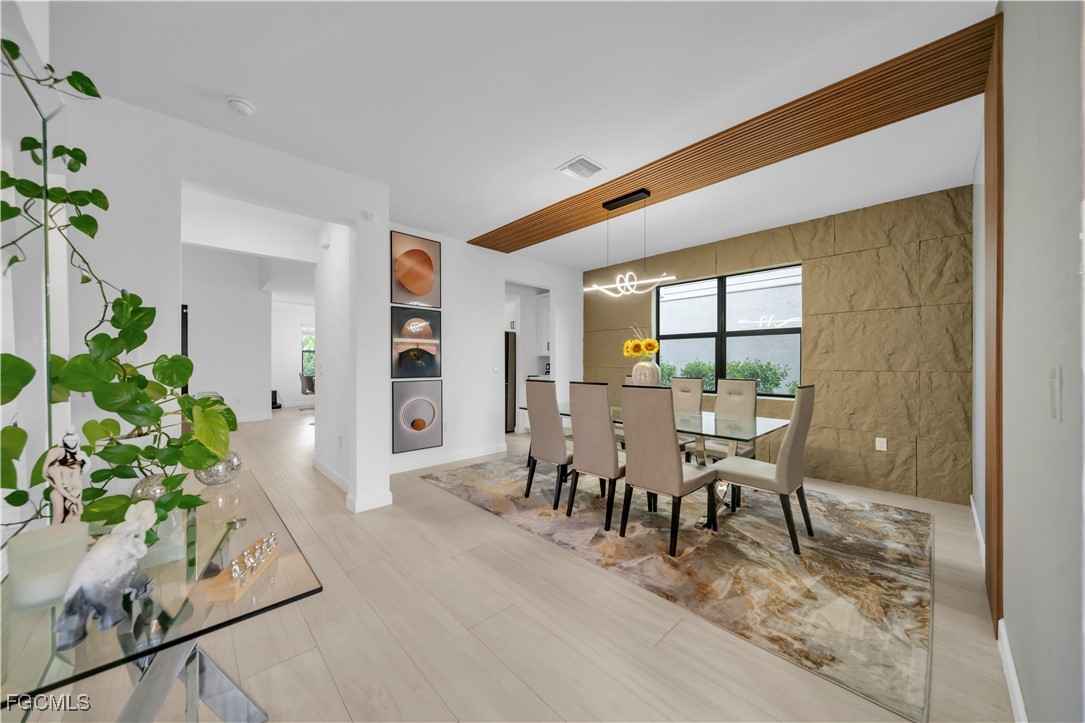 11264 Canopy Loop Fort Myers, FL 33913 - Photo 8 of 49 a living room with furniture and a potted plant
