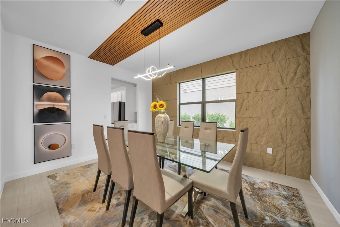 11264 Canopy Loop Fort Myers, FL 33913 - Photo 10 of 49 a view of a dining room with furniture and window