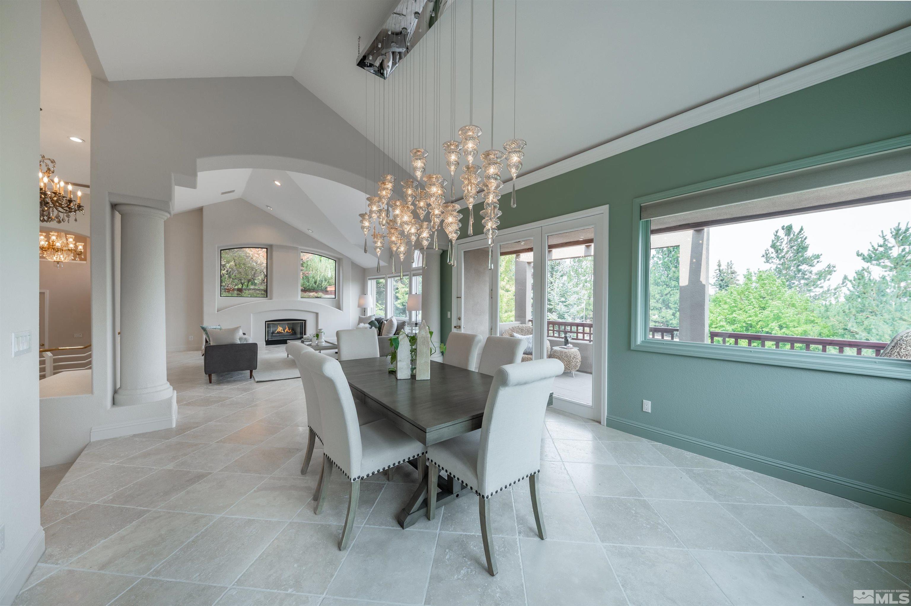 40 Sharps Circle Reno, NV 89519 - Photo 14 of 40 a view of a dining room with furniture a chandelier and window