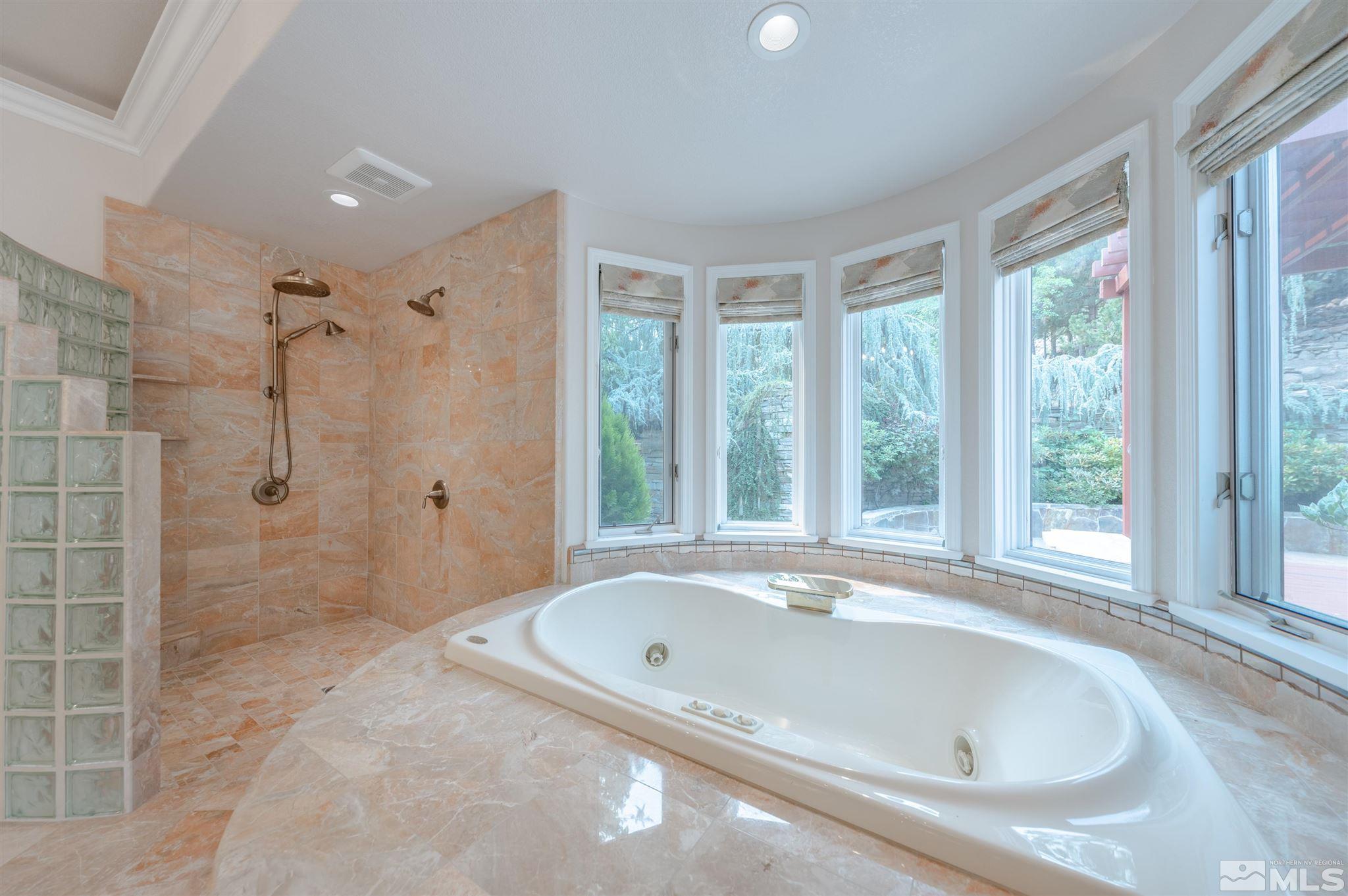 40 Sharps Circle Reno, NV 89519 - Photo 30 of 40 a bathroom with a bathtub and shower