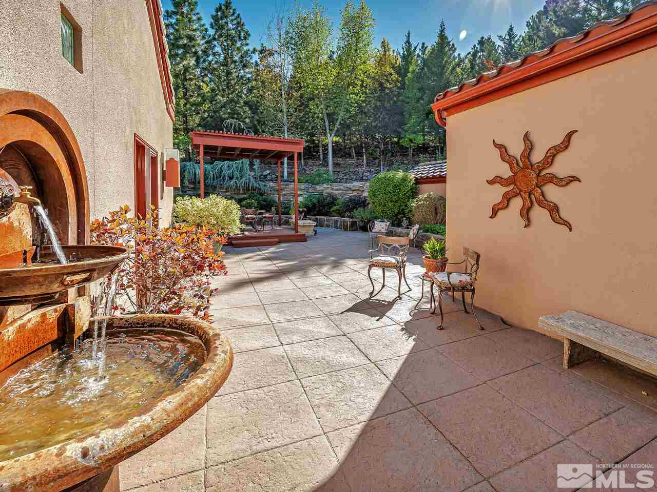 40 Sharps Circle Reno, NV 89519 - Photo 36 of 40 a view of a porch with furniture and floor to ceiling window
