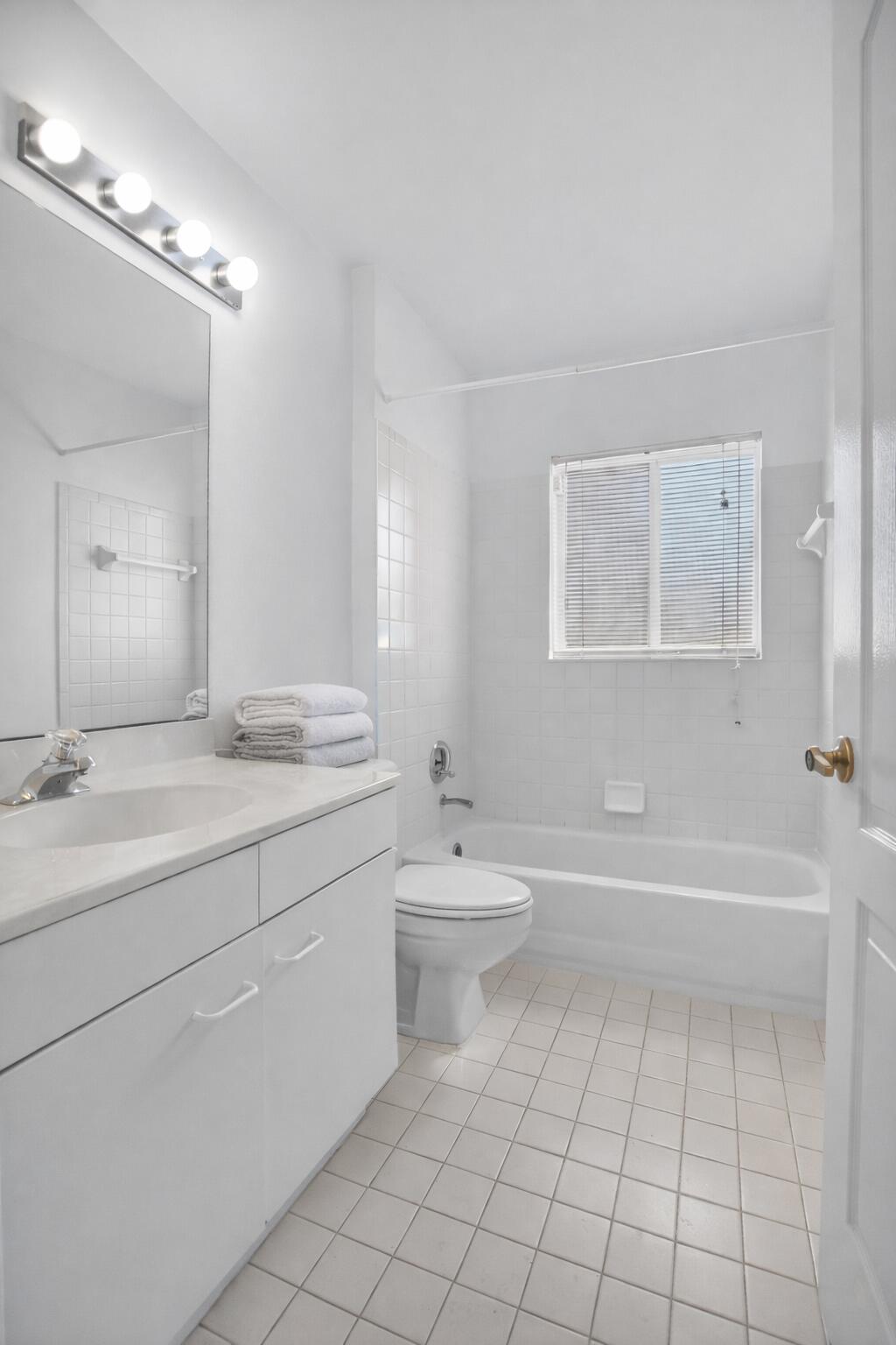 9635 Boca Gardens Circle North, Unit C Boca Raton, FL 33496 - Photo 18 of 30 Guest Bath