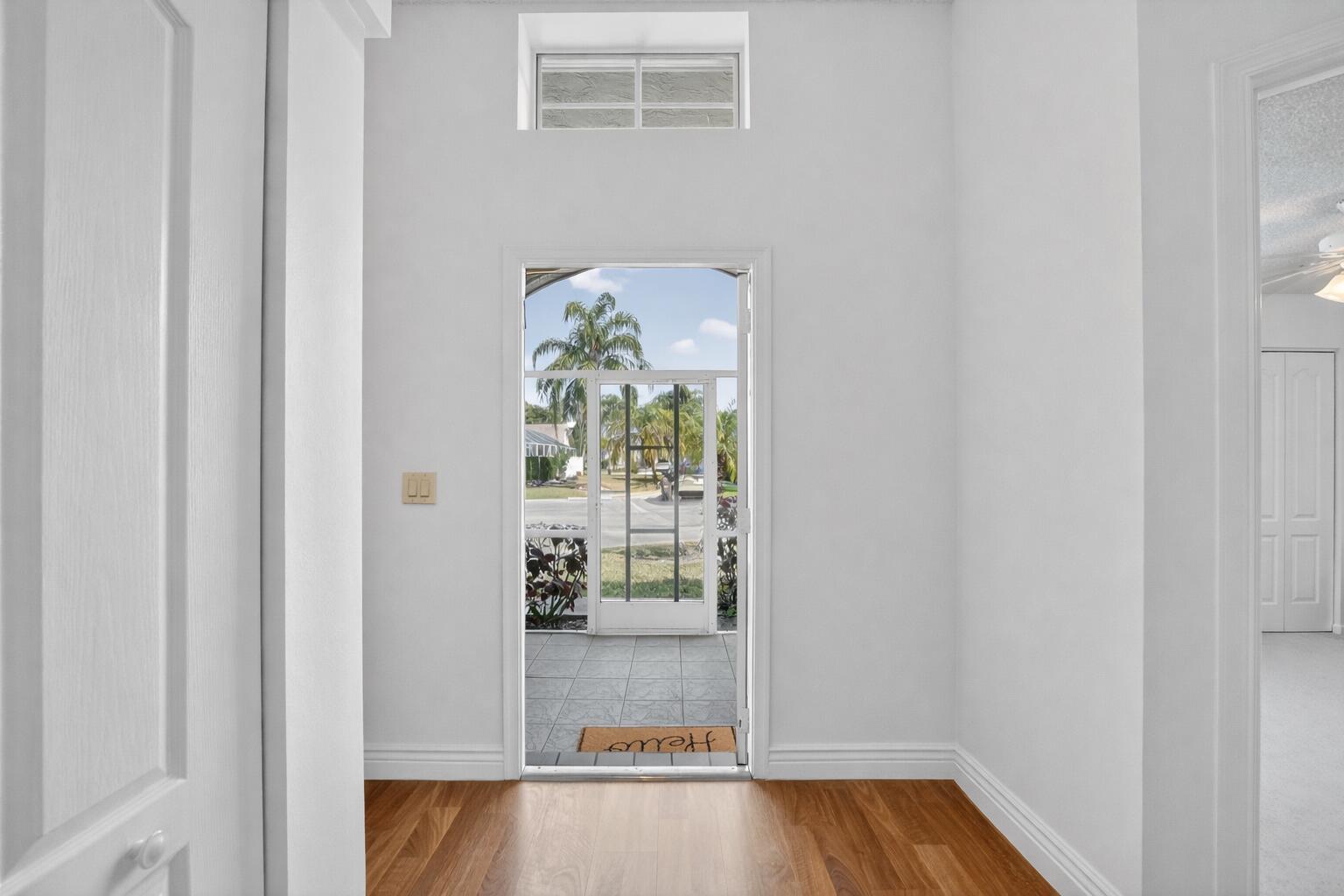 9635 Boca Gardens Circle North, Unit C Boca Raton, FL 33496 - Photo 19 of 30 Spacious Foyer and Front Entryway