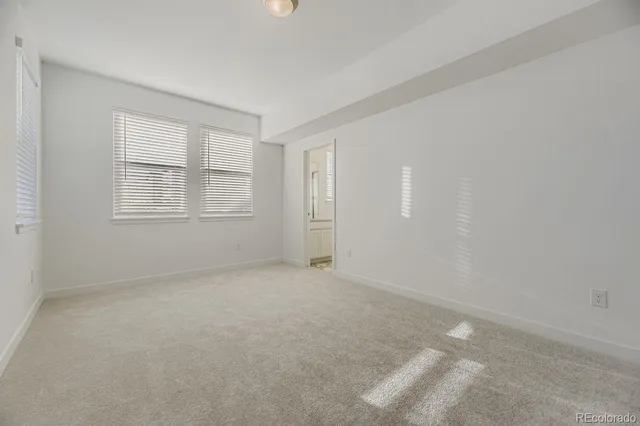 a black and white photo of a refrigerator