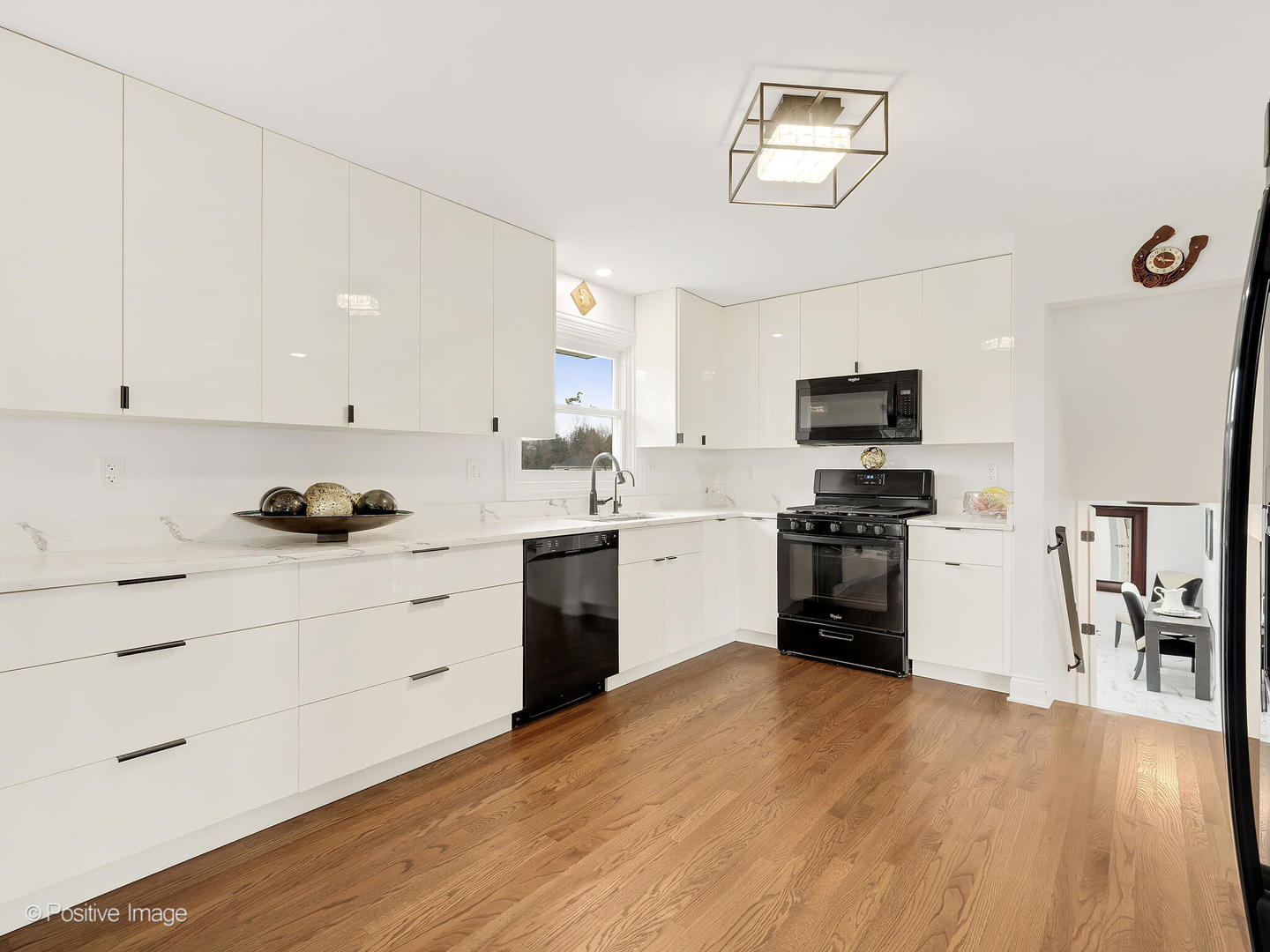 20-w065 South Frontage Road Lemont, IL 60439 - Photo 12 of 30 a kitchen with a refrigerator cabinets and wooden floor