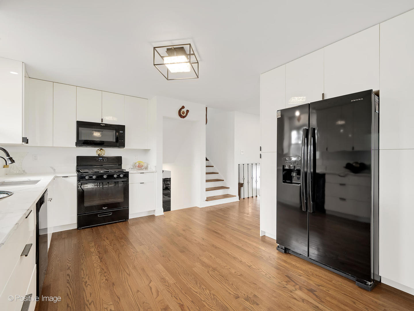 20-w065 South Frontage Road Lemont, IL 60439 - Photo 13 of 30 a kitchen with granite countertop a refrigerator and a stove top oven