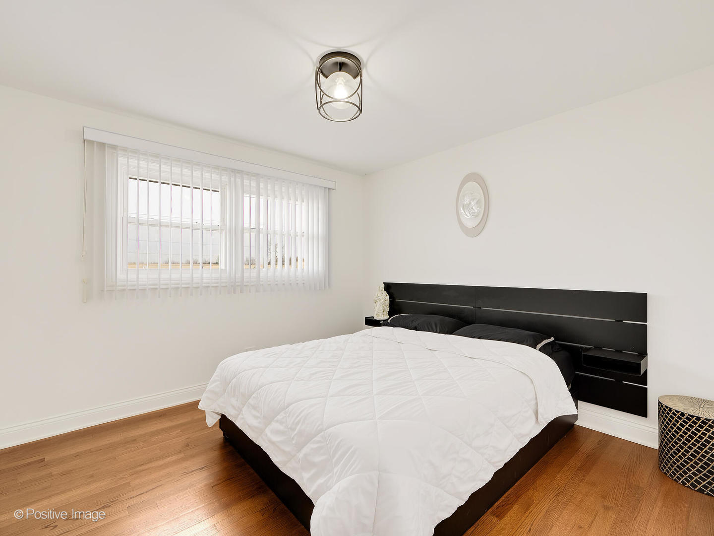 20-w065 South Frontage Road Lemont, IL 60439 - Photo 16 of 30 a bedroom with a bed and a window