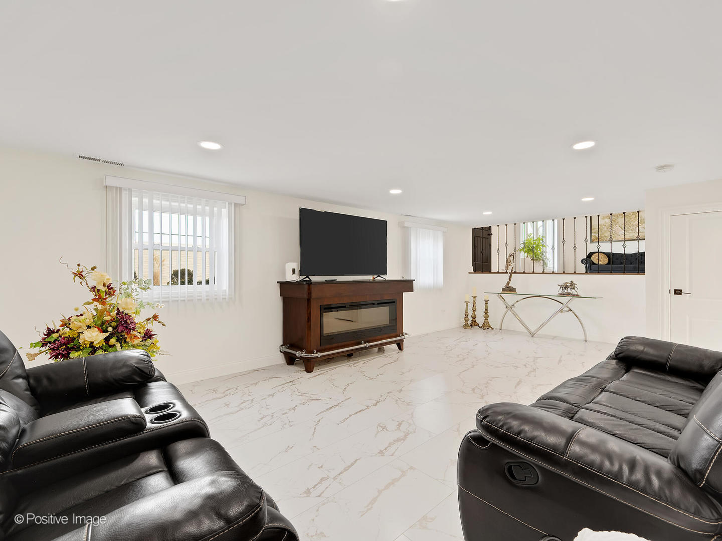 20-w065 South Frontage Road Lemont, IL 60439 - Photo 18 of 30 a living room with furniture and a flat screen tv