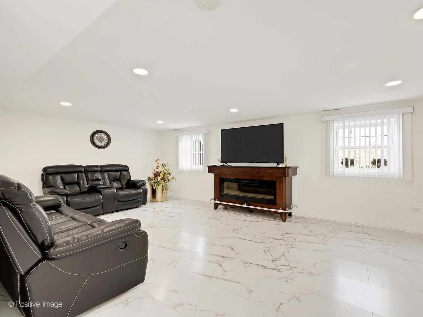 20-w065 South Frontage Road Lemont, IL 60439 - Photo 19 of 30 a living room with furniture and a flat screen tv