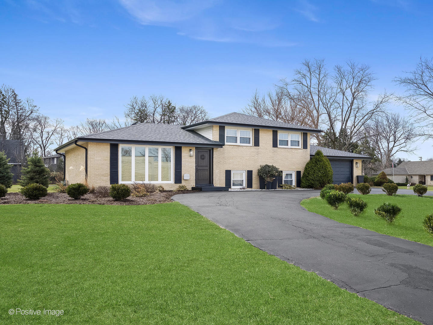 20-w065 South Frontage Road Lemont, IL 60439 - Photo 27 of 30 a front view of a house with a garden and porch