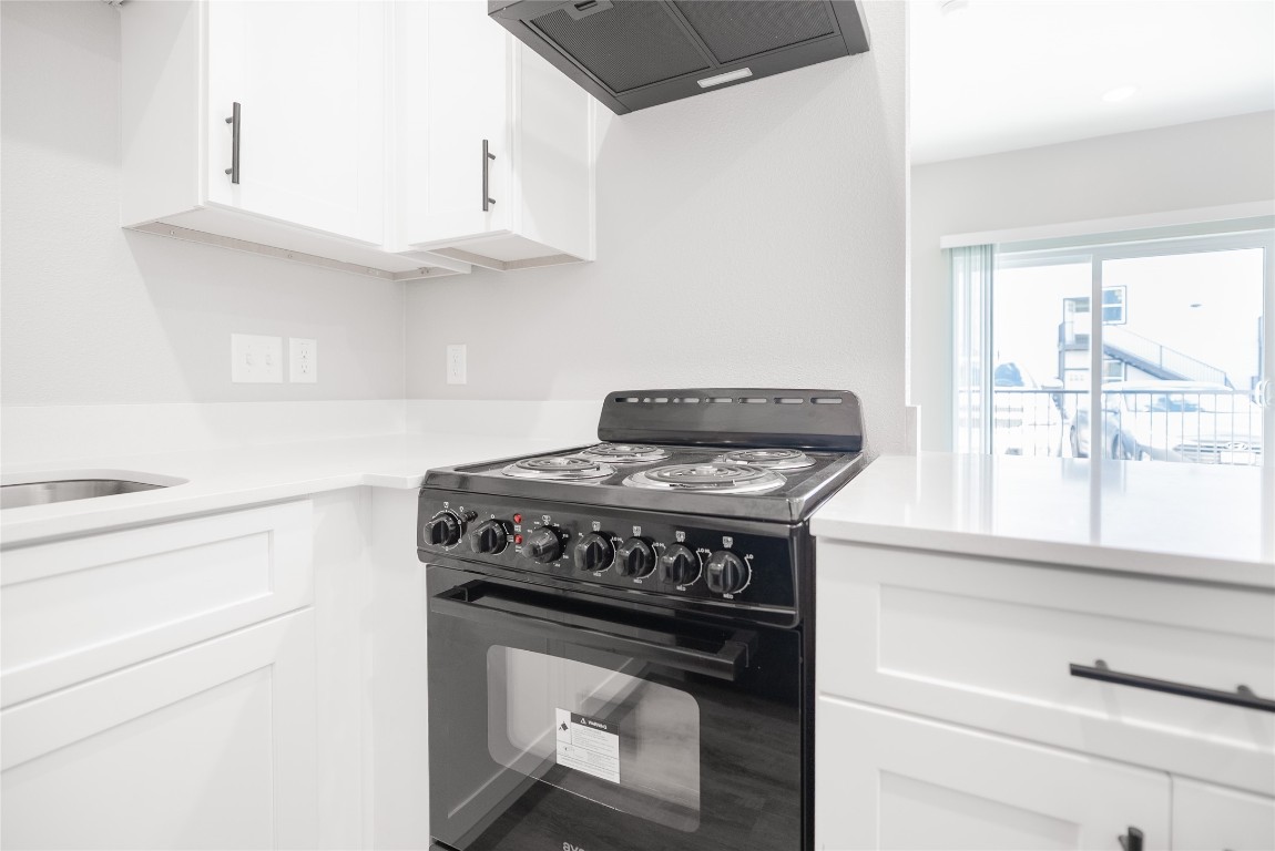 2101 Reinke Road, Unit 8112 Waller, TX 77484 - Photo 4 of 33 a stove top oven sitting inside of a kitchen