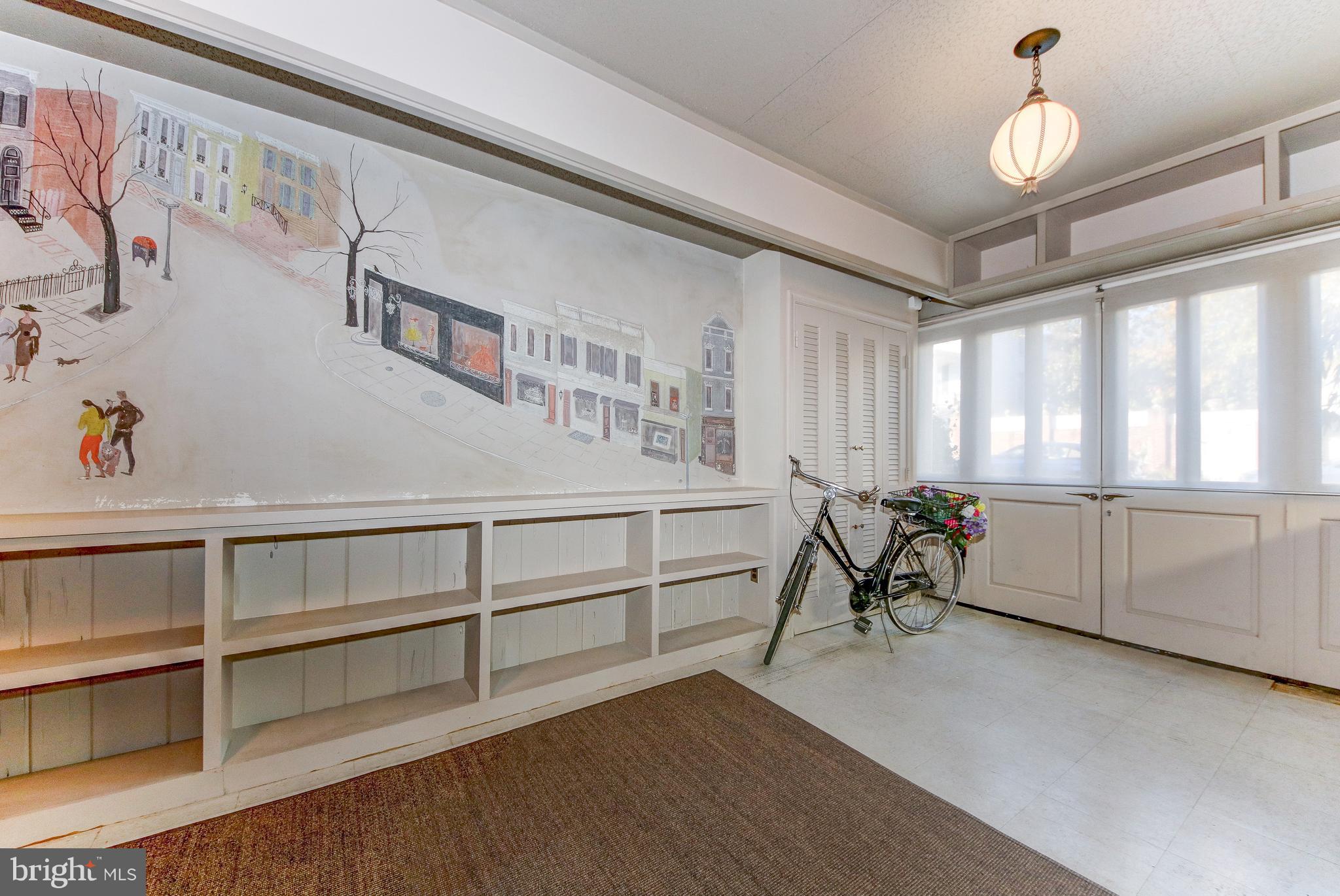 3204 Reservoir Road Northwest Washington, DC 20007 - Photo 25 of 28 Garage with built-ins and charming wall paintings