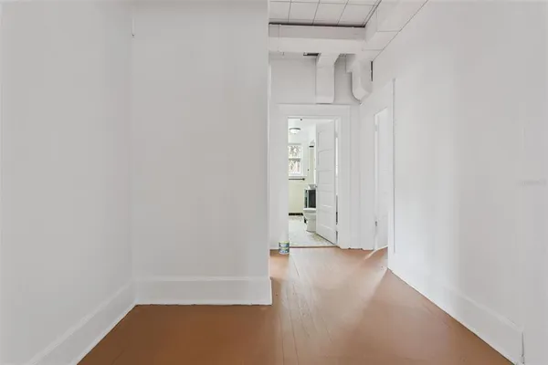 a bathroom with a toilet a sink and bathtub