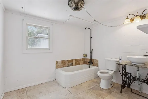 a bathroom with shower and a bathtub