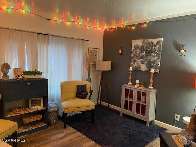 1550 Rory Lane, Unit 159 Simi Valley, CA 93063 - Photo 11 of 24 a bedroom with furniture and wooden floor