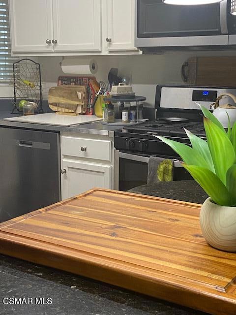1550 Rory Lane, Unit 159 Simi Valley, CA 93063 - Photo 2 of 24 a kitchen with a sink and cabinets