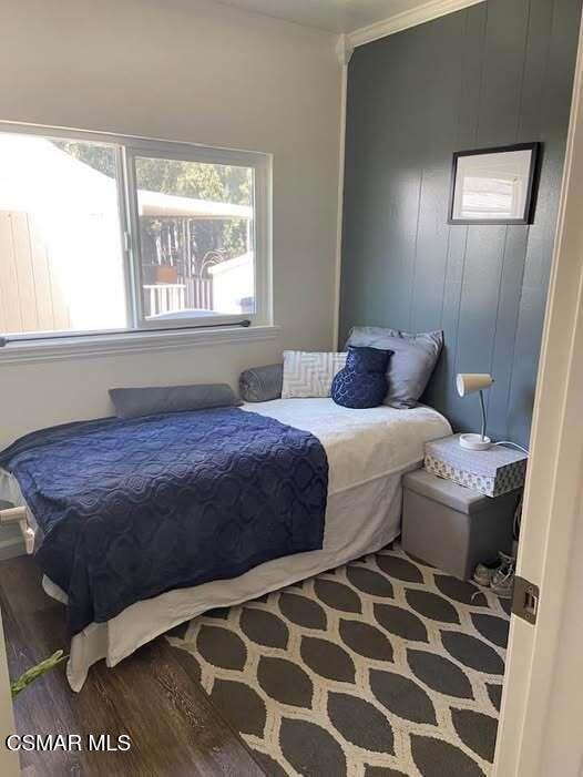 1550 Rory Lane, Unit 159 Simi Valley, CA 93063 - Photo 25 of 25 a bedroom with a bed and a window