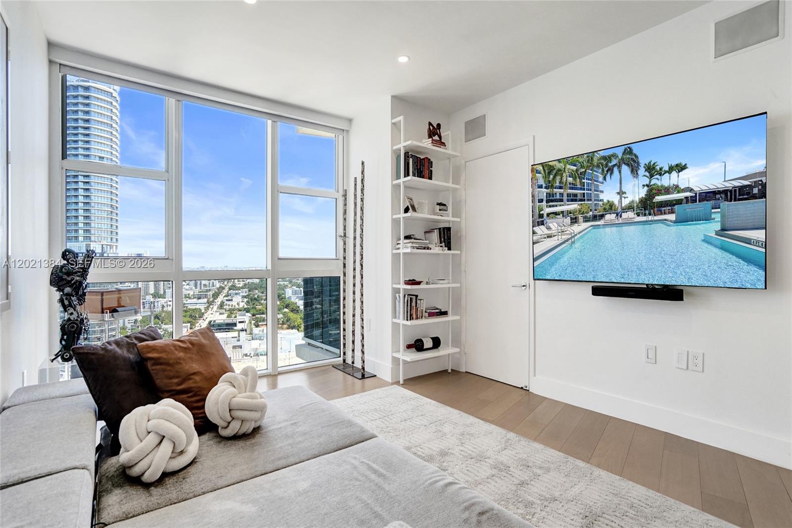 400 Alton Road, Unit PH11 Miami Beach, FL 33139 - Photo 37 of 49 a living room with furniture and a large window
