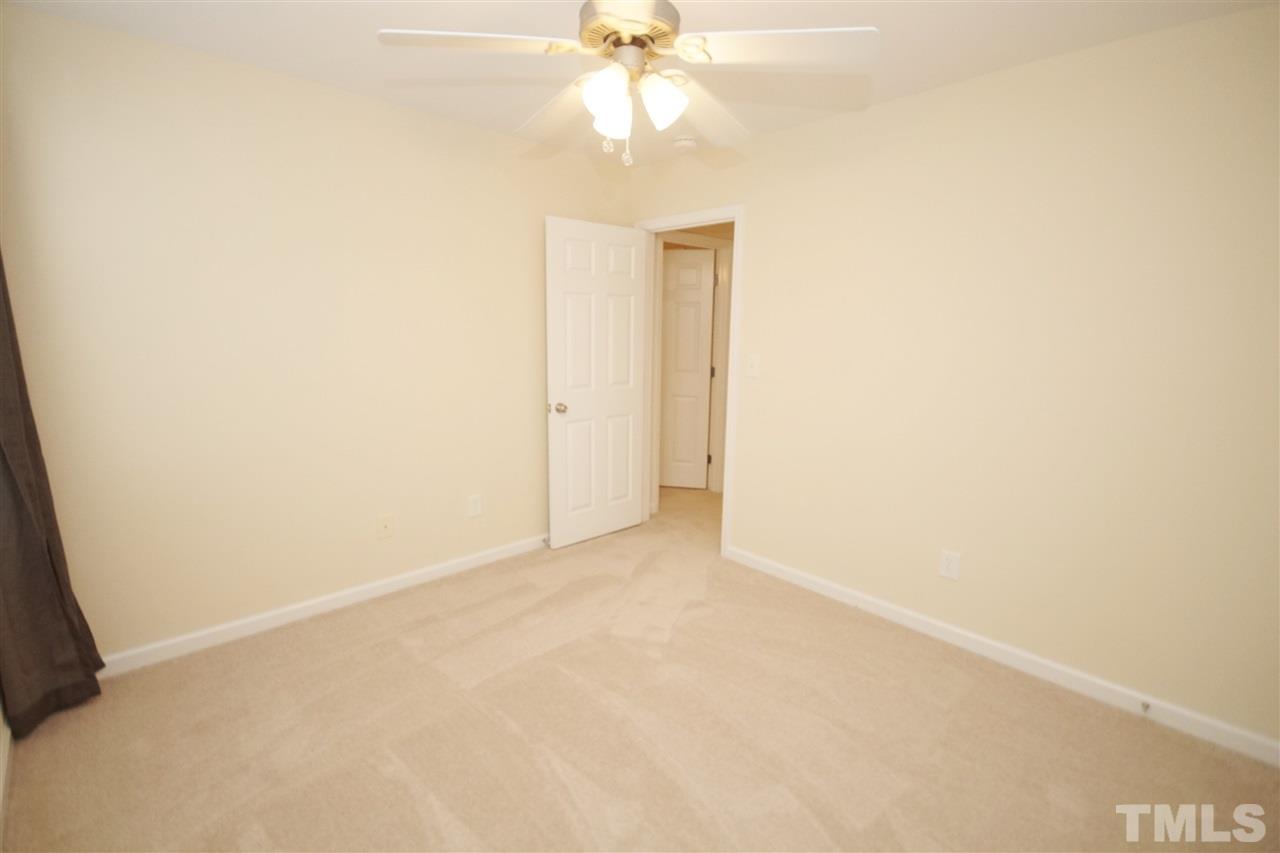 5209 Groveside Court Raleigh, NC 27613 - Photo 20 of 25 a view of an empty room