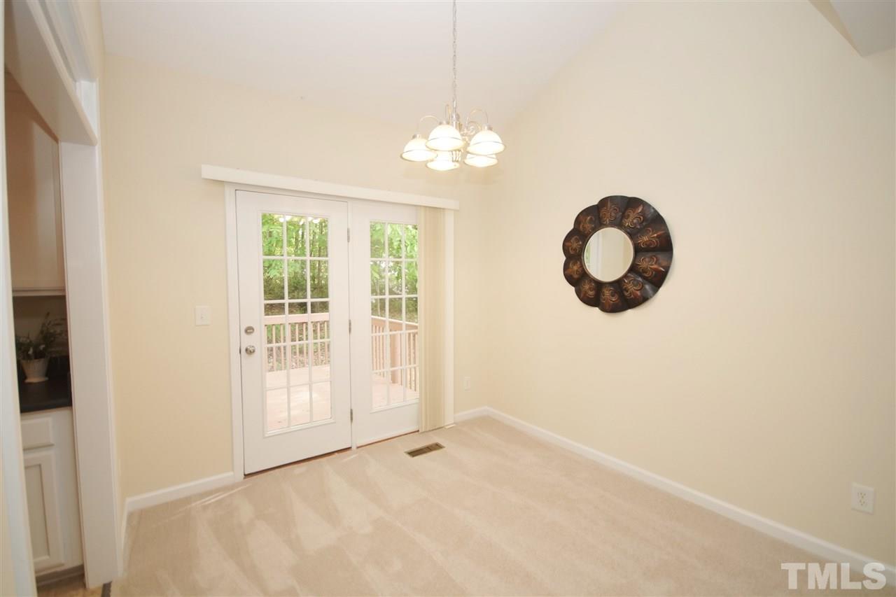 5209 Groveside Court Raleigh, NC 27613 - Photo 9 of 25 a view of a room with a large window