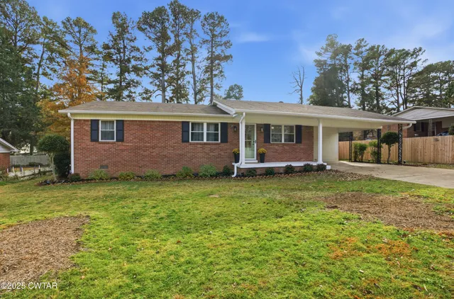 front view of house with a yard