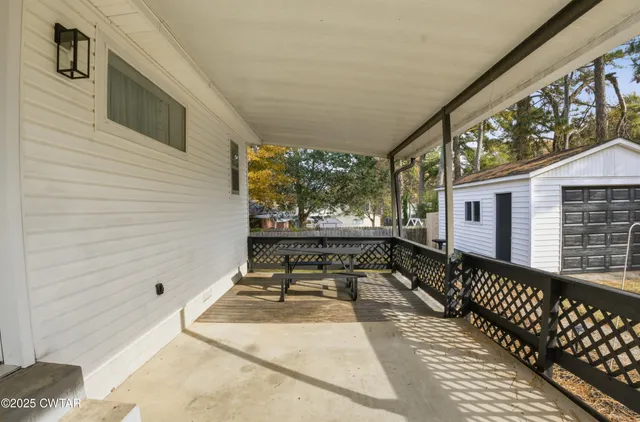 a black and white photo of a house