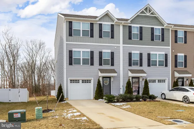 a front view of a building with street view