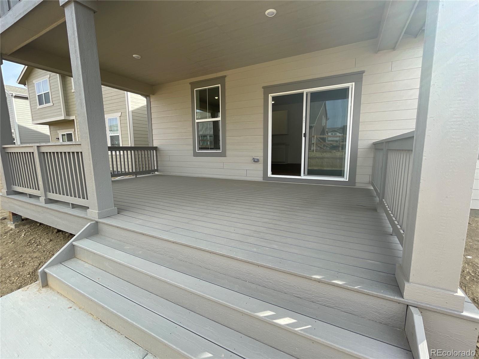 12883 Range Street Firestone, CO 80504 - Photo 27 of 39 a view of a entrance door of the house