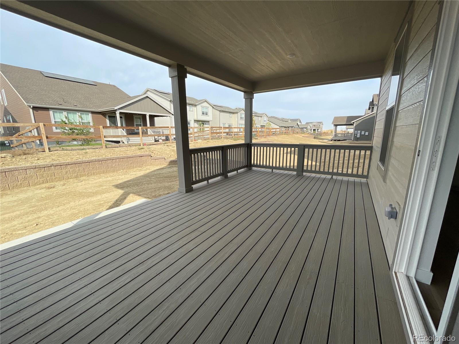 12883 Range Street Firestone, CO 80504 - Photo 28 of 39 a view of balcony with wooden floor