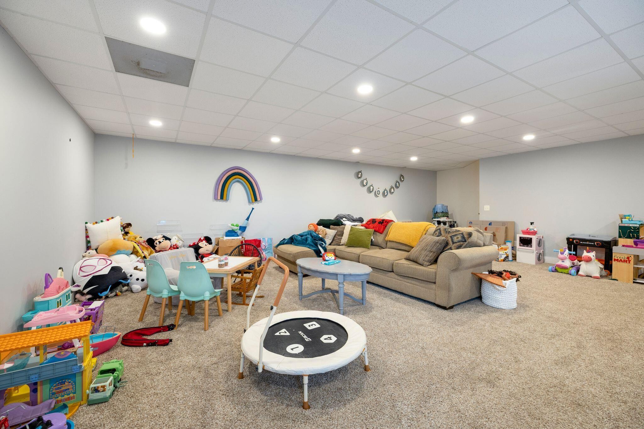 6866 Daus Mountain Road Whitwell, TN 37397 - Photo 31 of 49 a living room with lots of furniture and a couch