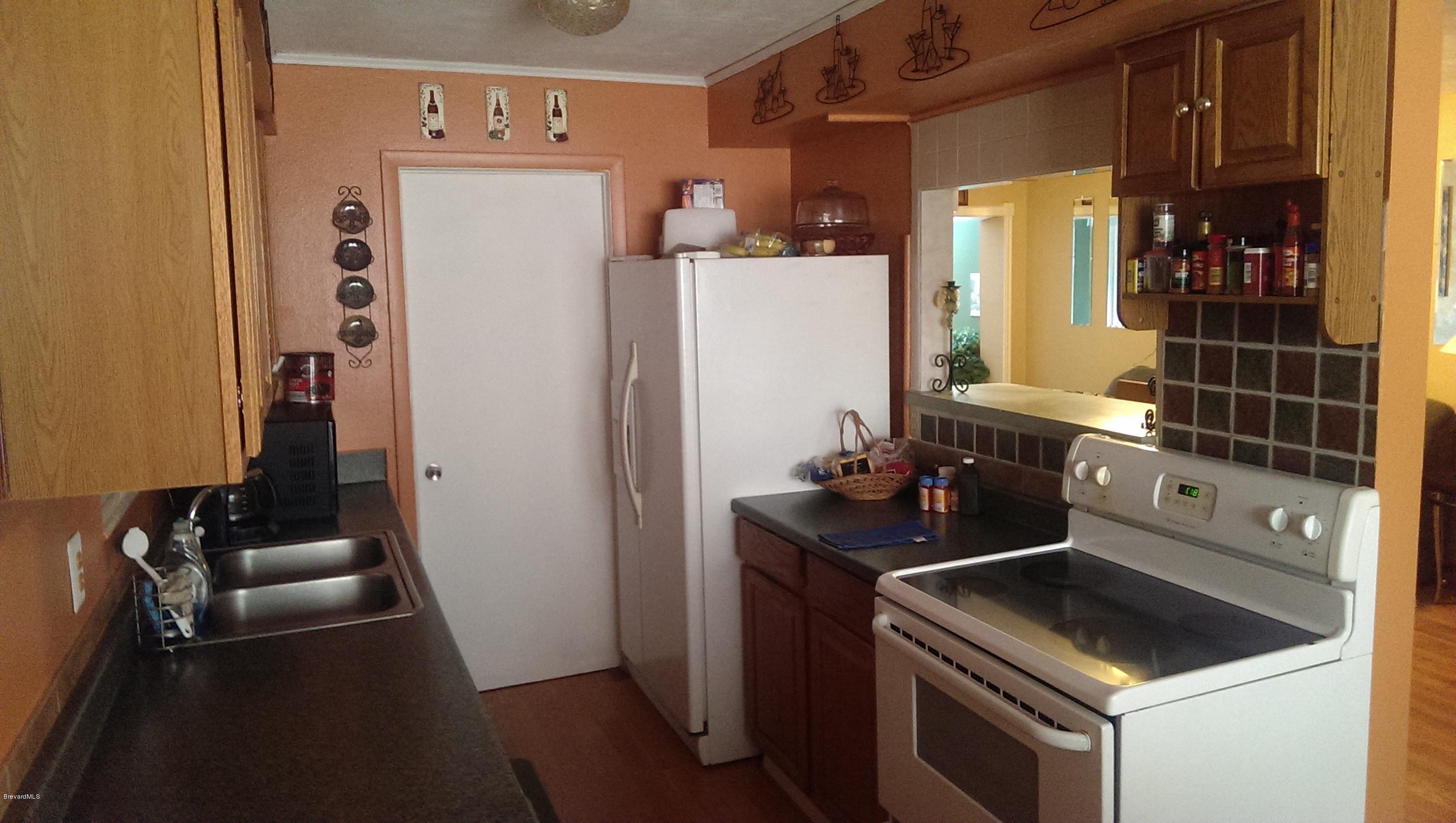 2526 Locksley Road Melbourne, FL 32935 - Photo 3 of 11 Kitchen 2