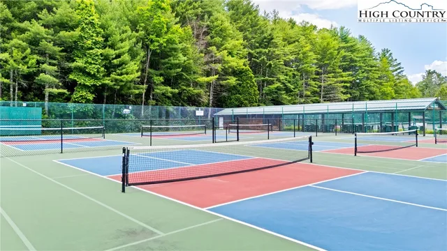 a tennis court that has tennis net