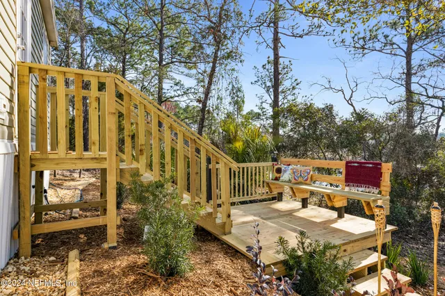 a view of a yard with a tree