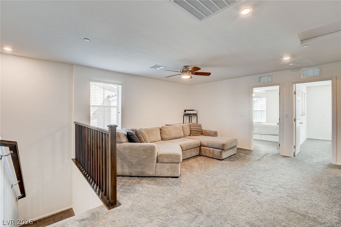 484 Filaree Place Henderson, NV 89015 - Photo 25 of 71 This versatile loft area offers comfortable living with soft carpeting and natural light.