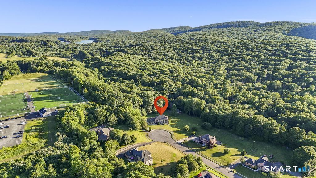 49 Partridge Lane Middletown, CT 06457 - Photo 39 of 39 an aerial view of a houses with a yard and lake view