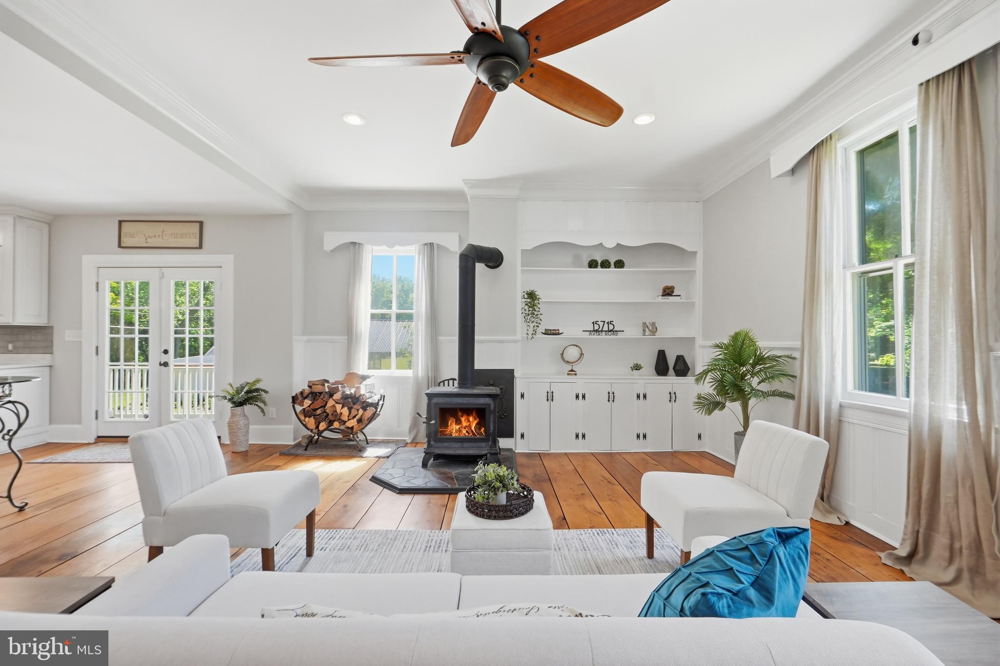15715 Avery Road Rockville, MD 20855 - Photo 13 of 116 Family room with wood burning stove