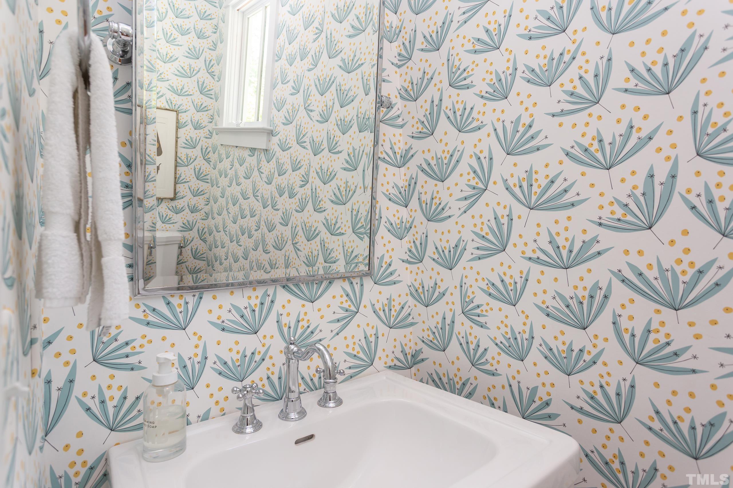 2709 North Mayview Road Raleigh, NC 27607 - Photo 22 of 66 a bathroom with a sink and mirror with bathtub