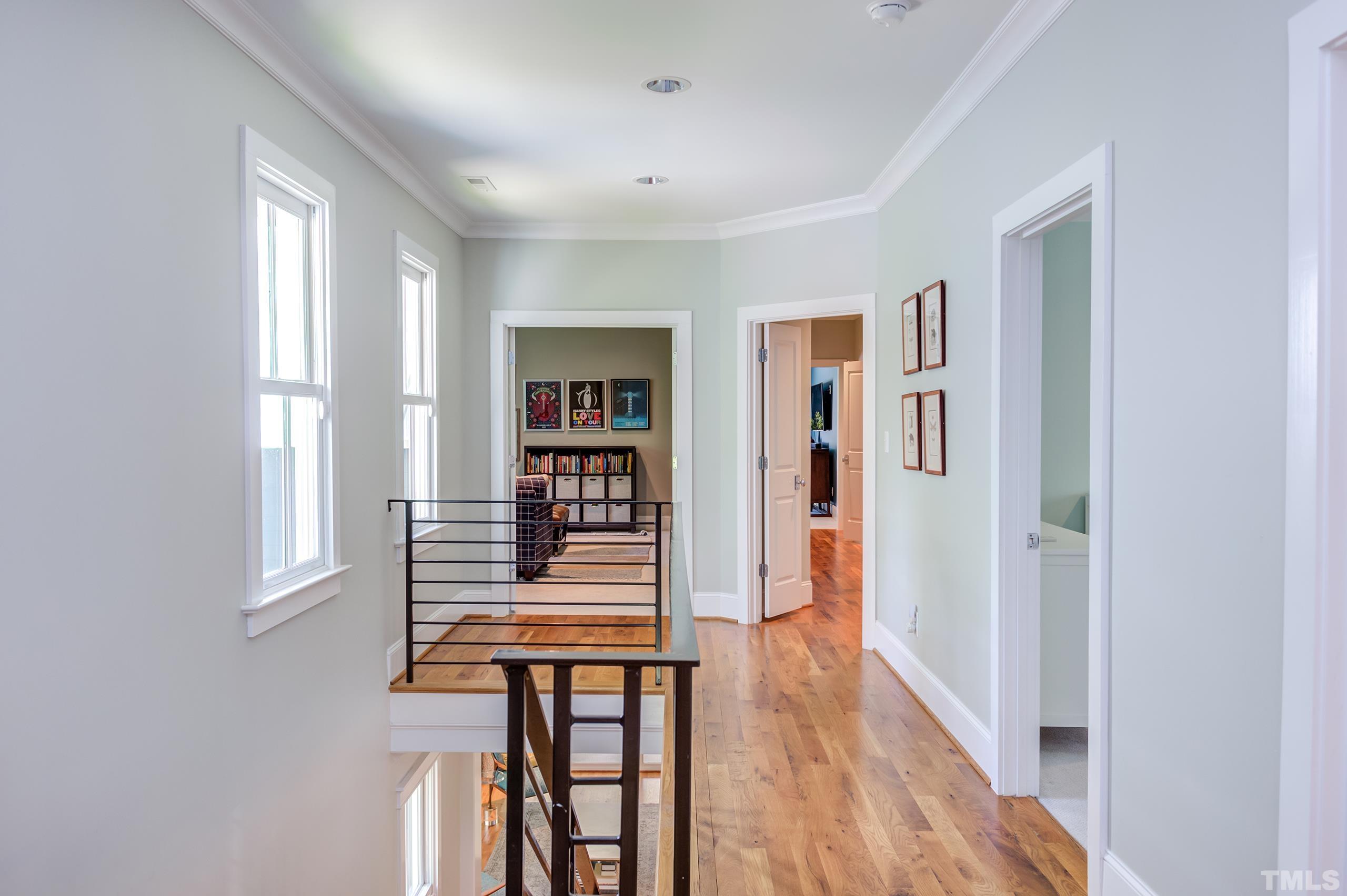 2709 North Mayview Road Raleigh, NC 27607 - Photo 24 of 66 a view of entryway with wooden floor and workspace