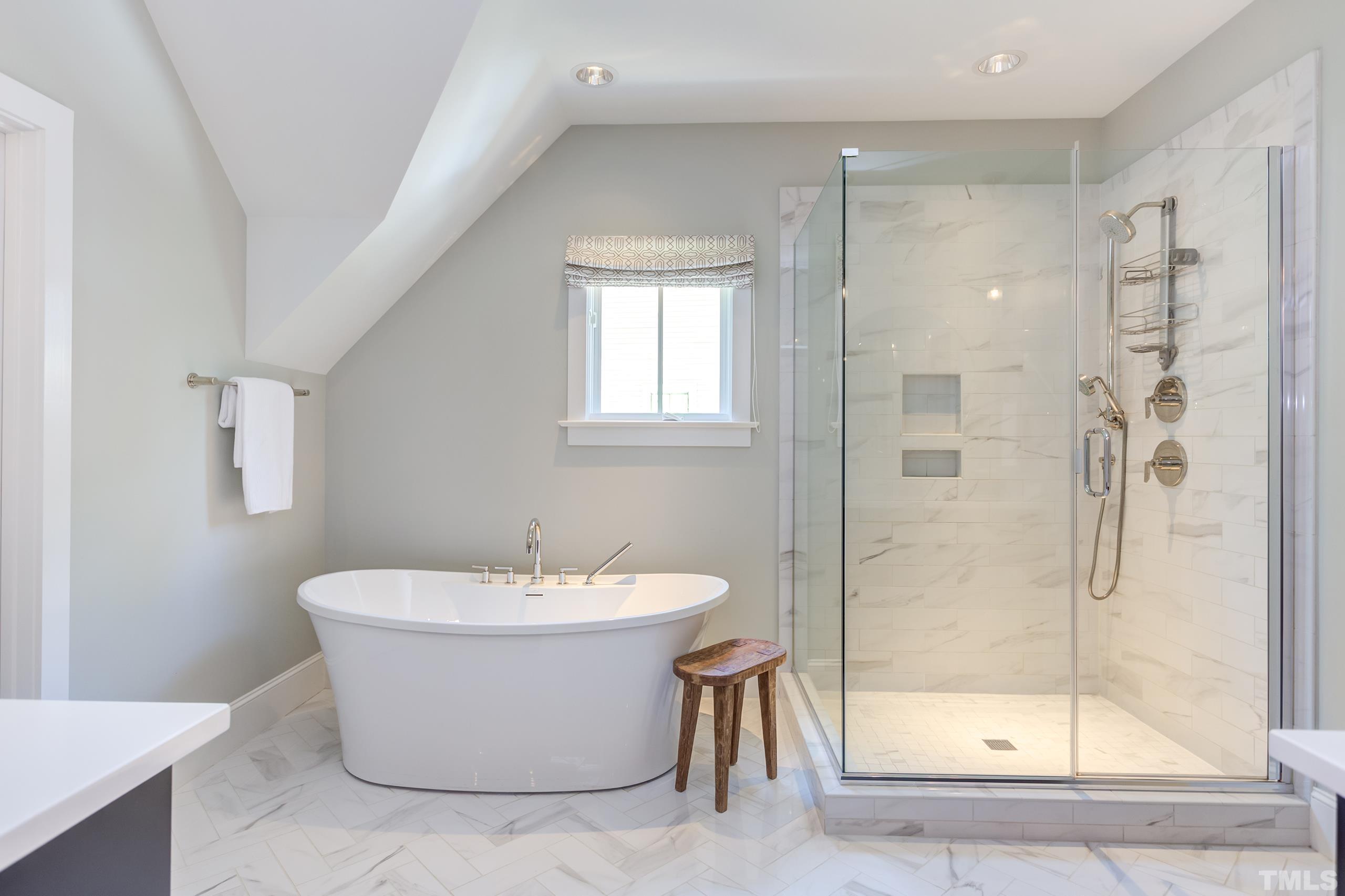 2709 North Mayview Road Raleigh, NC 27607 - Photo 34 of 66 a view of a bathroom with a bathtub and shower
