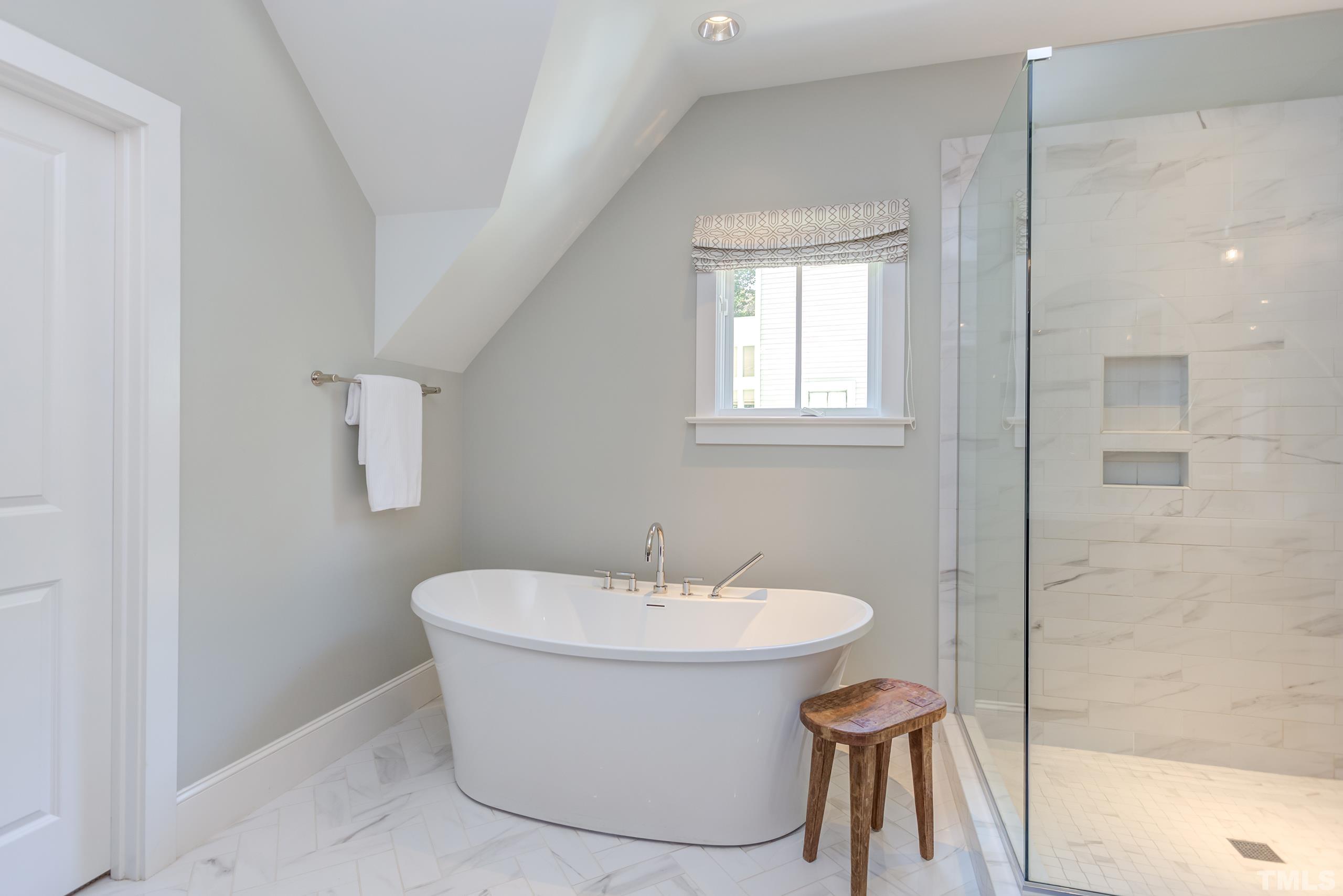 2709 North Mayview Road Raleigh, NC 27607 - Photo 35 of 66 a bathroom with a sink and a mirror