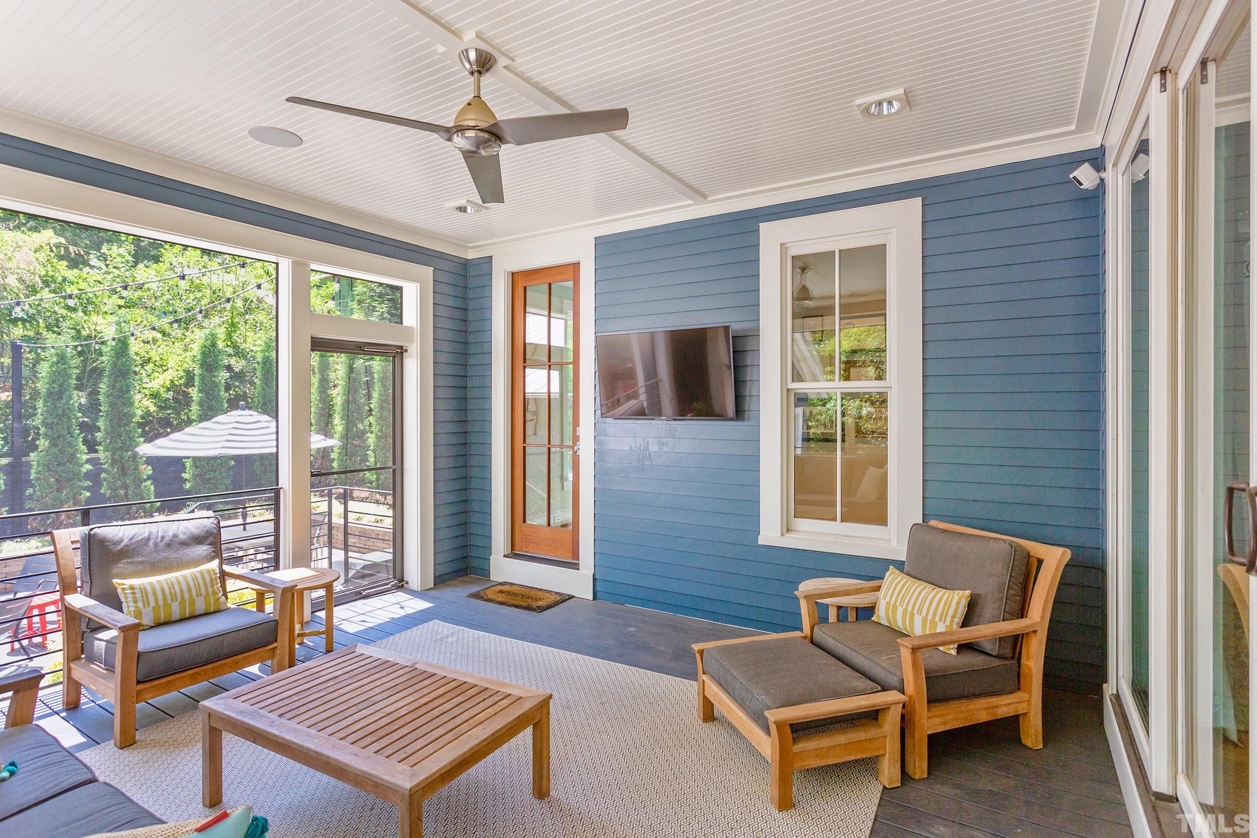 2709 North Mayview Road Raleigh, NC 27607 - Photo 55 of 66 a outdoor space with patio the couches and a dining table with garden view