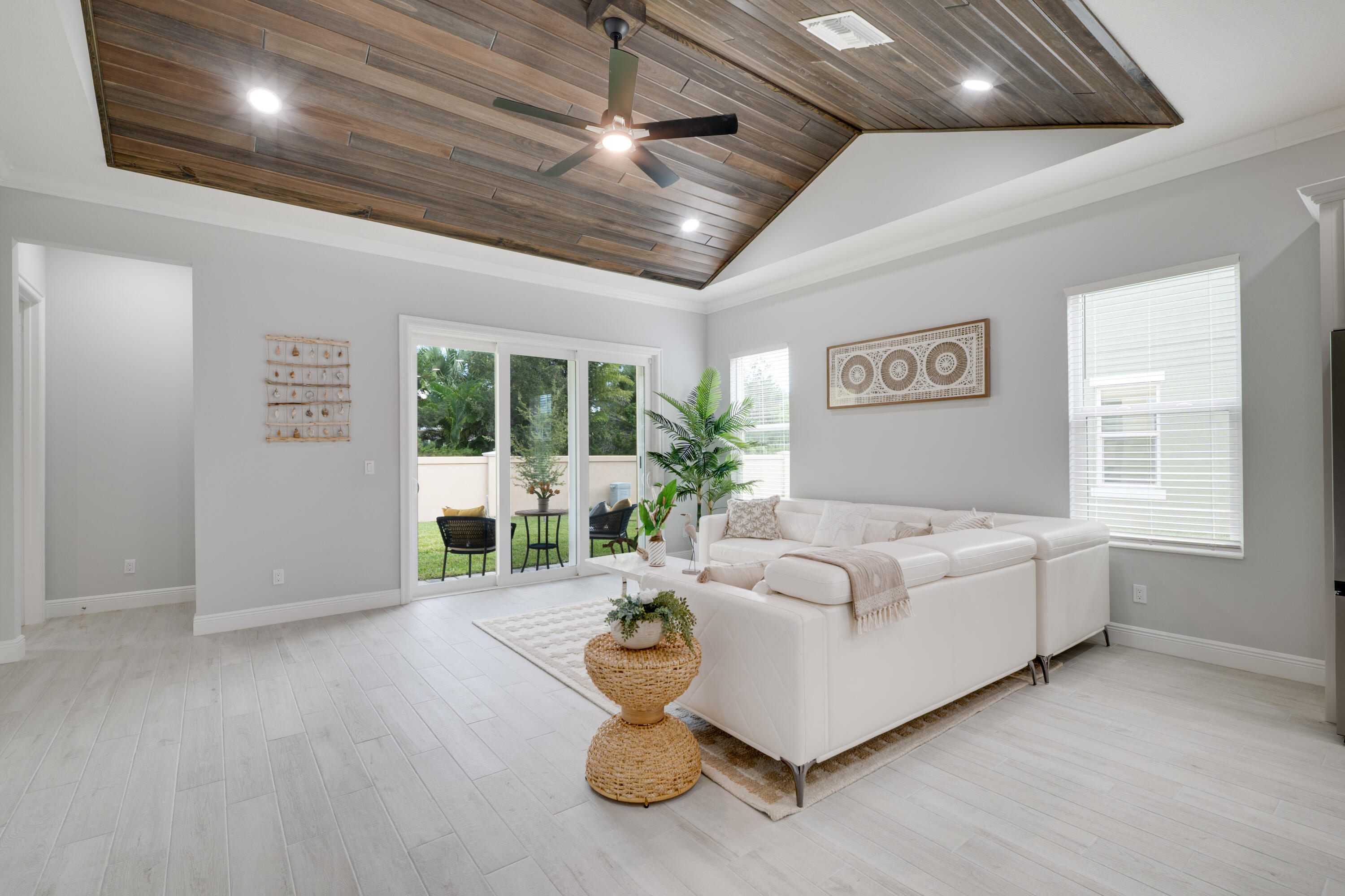 2005 Bridgepointe Circle, Unit 99 Vero Beach, FL 32967 - Photo 14 of 37 a living room with furniture and large window